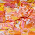 Vibrant Orange and Pink Floral Tunic Set with Jeweled Buttons